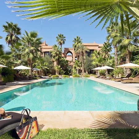 ホテル チグミザ スイーツ&パビリオンズ Ouled Jelal エクステリア 写真 The swimming pool at the hotel
