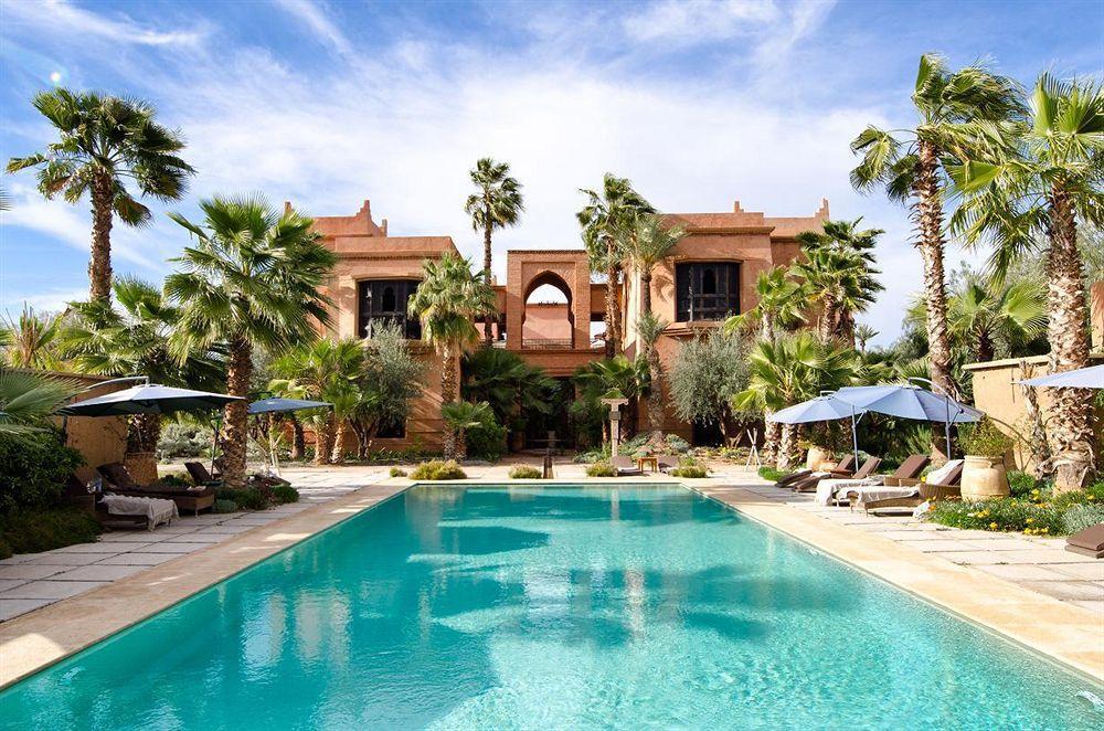 ホテル チグミザ スイーツ&パビリオンズ Ouled Jelal エクステリア 写真 The swimming pool at the hotel