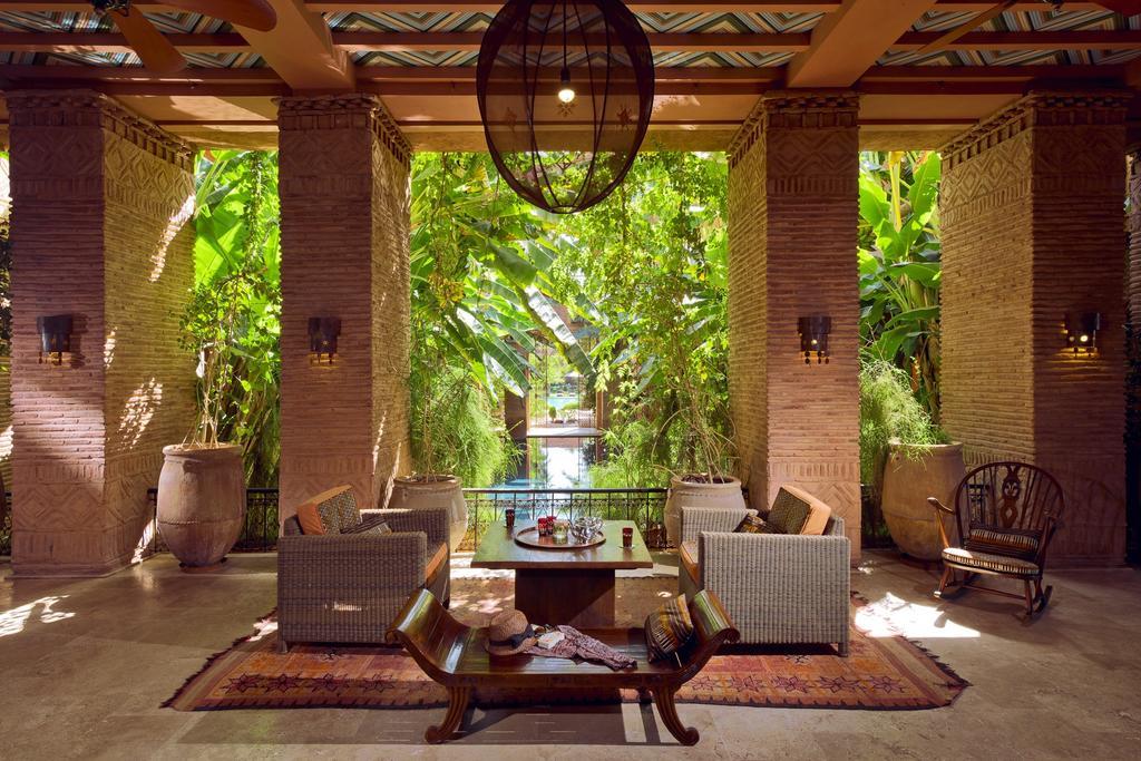 ホテル チグミザ スイーツ&パビリオンズ Ouled Jelal エクステリア 写真 The lobby at the Four Seasons Resort, Maldives