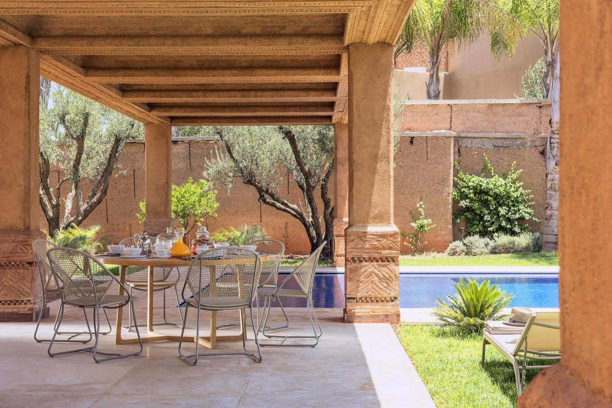 ホテル チグミザ スイーツ&パビリオンズ Ouled Jelal エクステリア 写真 The swimming pool at the hotel