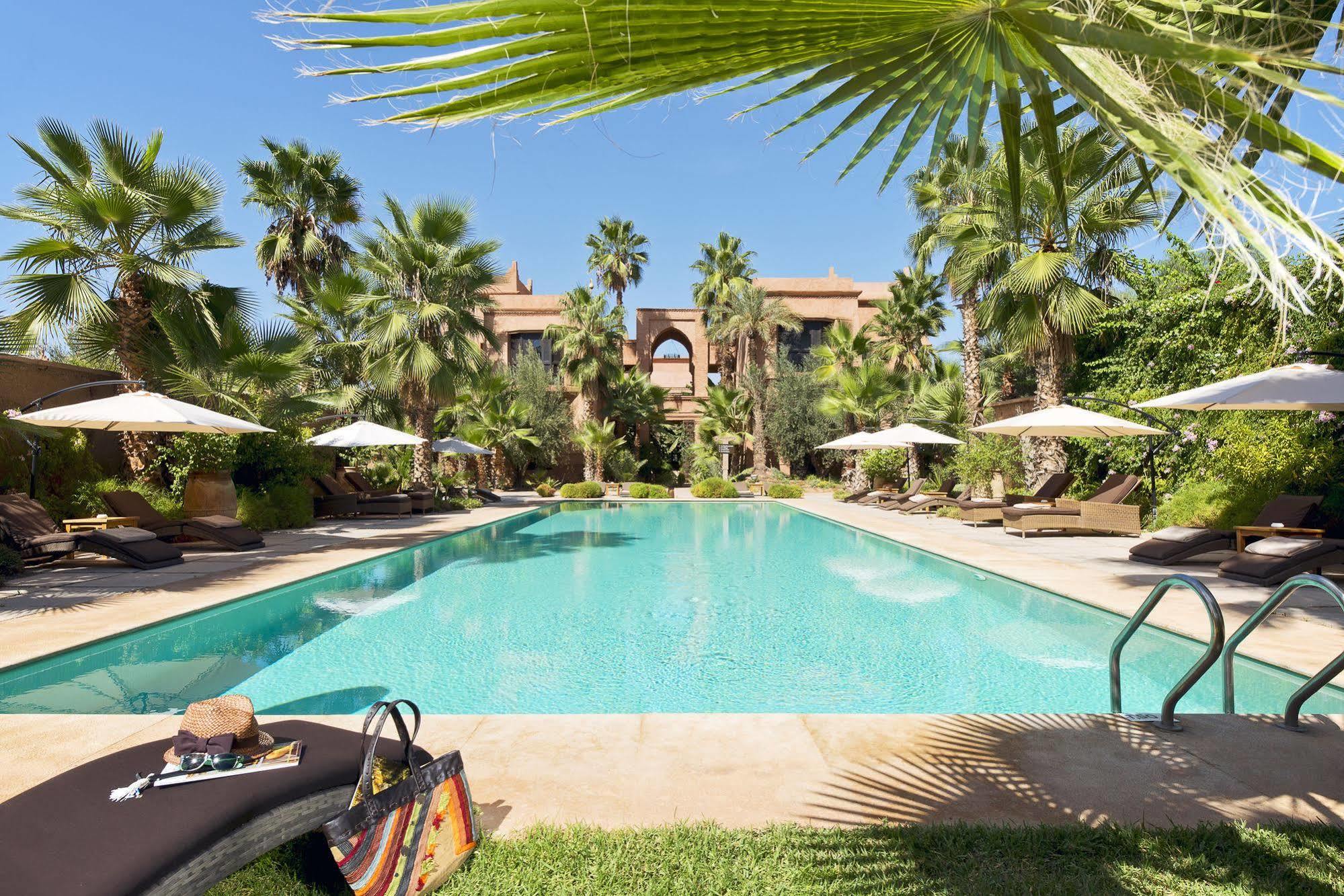 ホテル チグミザ スイーツ&パビリオンズ Ouled Jelal エクステリア 写真 The swimming pool at the hotel